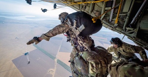 British Army paratroopers (pictured dropping on Ukraine during an exercise in 2020) will begin trials of IrvinGQ Mk 1 and EPC parachutes in August.