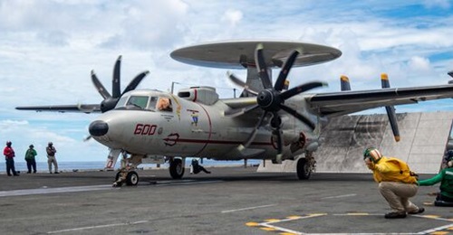 An E-2D Hawkeye launches from USS 
        
        on 2 August in the Philippine Sea.