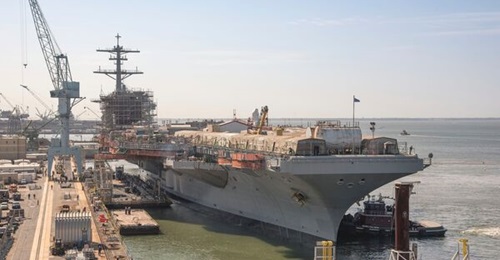 Aircraft carrier USS 
        
         is scheduled to be redelivered to the US Navy following the ship's overhaul in 2023.