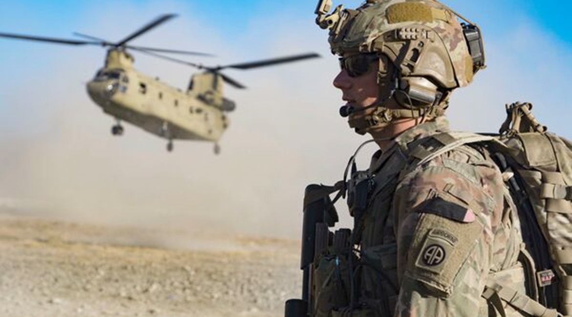 A US Army soldier in southeastern Afghanistan. The US and UK announced on 12 August that they will deploy 3,000 and 600 troops respectively to Afghanistan to help evacuate their civilians and Afghan special immigrant visa applicants.