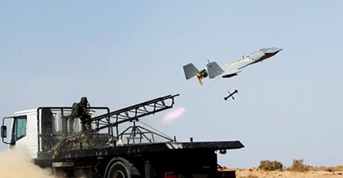 An Omid attack UAV is launched from a rail during the exercise.
