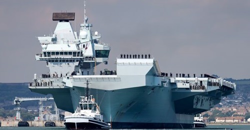 HMS 
        
        is pictured departing from Portsmouth on 27 August for its 'Westlant 22' deployment. The 65,000-tonne warship broke down shortly afterwards and is now anchored off the south coast while a mechanical fault with the starboa...