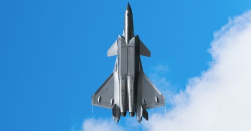 A J-20 fighter jet performs during Changchun Air Show on 27 August 2022. China is said to be integrating some J-20s with the domestically developed WS-10 engine. However, the length of the engine exhaust of this aircraft shows that it is powered by the...