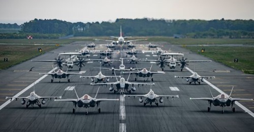 Twelve Lockheed Martin F-35A Lightning II Joint Strike Fighters of the JASDF's 302nd Squadron participate in an elephant walk with various US fighter and support aircraft at Misawa Air Base in Japan on 13 May 2022. Japan is moving to procure additional...