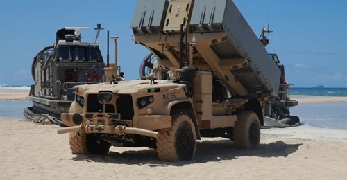 A NMESIS launcher deploys into position aboard the Pacific Missile Range Facility, Barking Sands, Hawaii, in August 2021. The NMESIS and its NSMs participated in a live-fire exercise during 'Large-Scale Exercise 2021'.