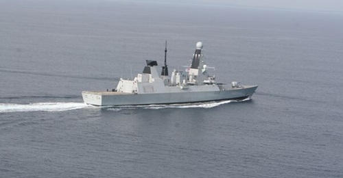 sails through a calm Irish Sea on trials.