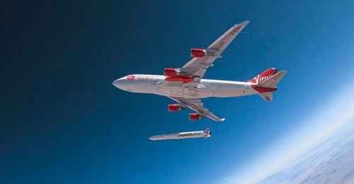 Cosmic Girl, a modified Boeing 747, releases LauncherOne mid-air for the first time during a July 2019 drop test.