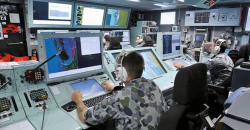 A view of the operations room of the RAN Anzac-class frigate HMAS 
        
         displaying Saab's 9LV Mk 3E.