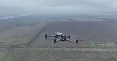 A still from video footage taken by another 'drone' that appears to show the first air-to-air combat involving only unmanned aircraft.