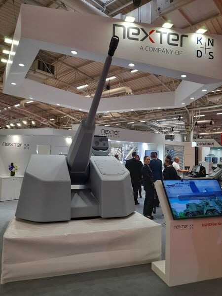 A full-scale mock-up of the Thales and Nexter RapidFire turret is pictured on display in its final configuration at the Nexter stand at Euronaval 2022, Paris.