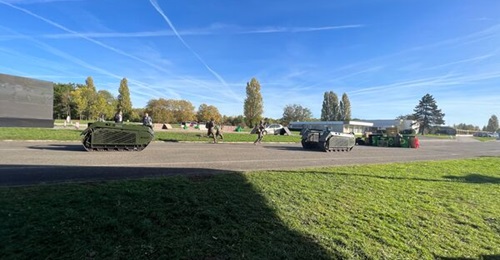 THeMIS UGVs pictured alongside French Army soldiers of the Vulcan robotics testing unit at a demonstration of iMUGS autonomy capabilities, Camp Satory, in October 2022.