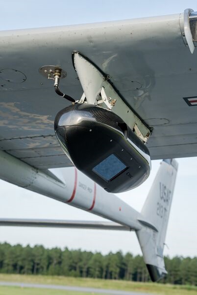 Logos Technologies' BlackKite wide-area motion imagery system, shown here mounted on the wing of a Cessna aircraft, can monitor a city-sized area.