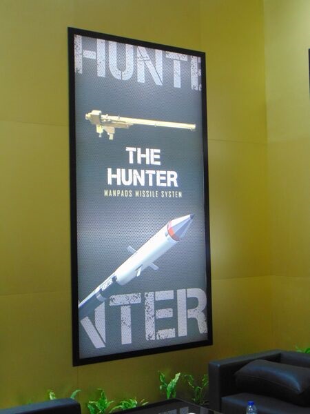 A poster of the Hunter MANPADS at the Jadara stand at SOFEX 2022.