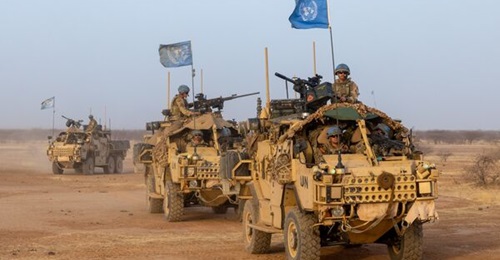 Soldiers from the 1st Battalion, The Queen's Dragoon Guards patrol in Mali.