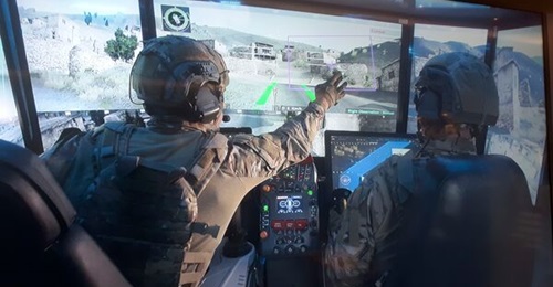 Interior of a Carmel armoured fighting vehicle (AFV) prototype, showing touchscreen controls and crew layout. Phase 2 will see an Eitan AFV equipped with a single panoramic screen at the front of the vehicle and four separate operator stations, each wi...