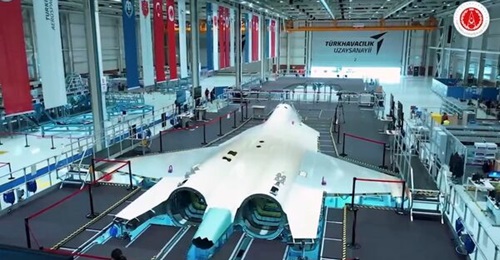 Screenshot from Turkish Aerospace video showing the TF-X/MMU future fighter prototype on the assembly line.