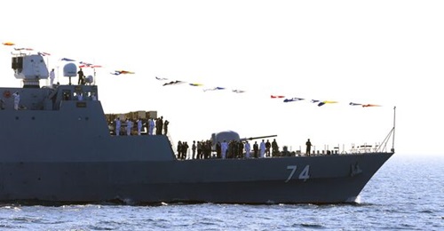 with the new rotating radar above and launcher in front of its bridge.