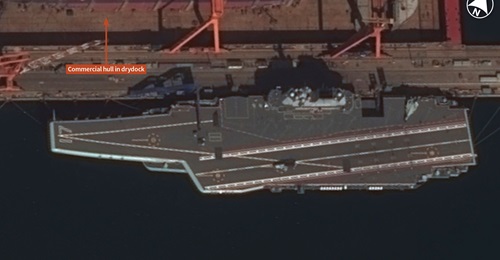 The Chinese carrier 
        
        , shown berthed at Dalian shipyard, should now be considered operational, the Pentagon reported.