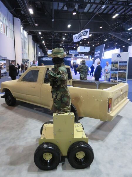 Marathon's new T50 (foreground) and T100 Autonomous Robotic Targets shown at I/ITSEC 21. The scuff marks on the armour plating of the T50 are from 6.8 mm rounds.