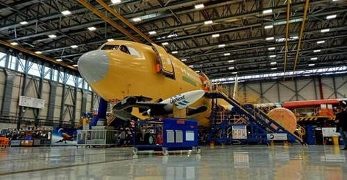 The Auto'Mate unmanned aircraft seen in front of an Airbus A330 at the company's Madrid facility, ahead of trials in early 2023.