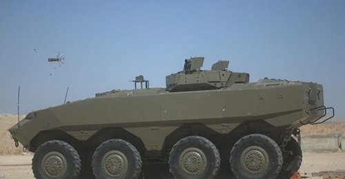 An Iron Fist fitted to the turret of an Eitan IFV launches an interceptor during the tests.