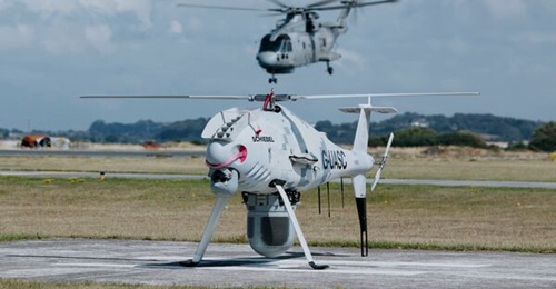 Trials of the Camcopter S-100 took place off the North Wales coast in August. The I-Master radar gimbal unit is clearly visible beneath the fuselage.