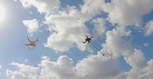 Xtend's Griffon C-UAS engaging with a UAV using its net effector.