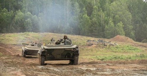 Polish BMP IFVs move towards the river during a joint river crossing rehearsal as part of Exercise Allied Spirit, a joint US-Polish exercise at Drawsko Pomorskie training area in June 2020. A Rosomak IFV is in the background. About 6,000 US and Polish ...