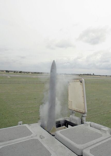 A CAMM is ejected from a modified Mk 41 launcher during a test.