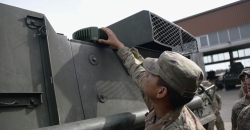 A US Army solider with 2nd Squadron, 2nd Cavalry Regiment inspects a MAPS Gen 1 component installed on a tactical vehicle.