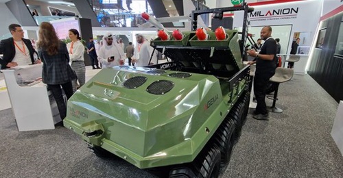 The Agema UGV configured as a carrier for four Warble Fly loitering munitions on display at IDEX 2023.