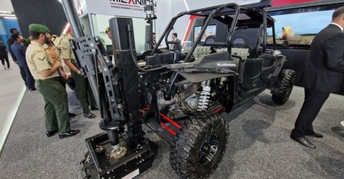 The Alakran-S, fitted to a Polaris RZR ATV, was displayed at IDEX 2023. Two of the vehicle's rear seats were removed to accommodate the mortar and racks for 24 81 mm mortar bombs, but it was otherwise unmodified.