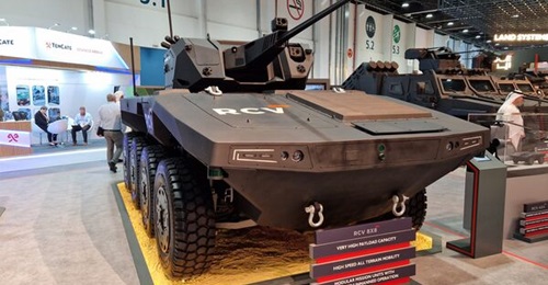 Nimr's 8×8 RCV with a John Cockerill Defense's Cockerill 1030 unmanned turret as displayed at IDEX 2023.