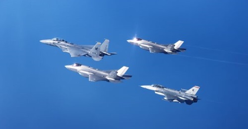 The Republic of Singapore Air Force's F-15SG and F-16D flying alongside the Royal Australian Air Force's F-35Bs during a multilateral exercise.