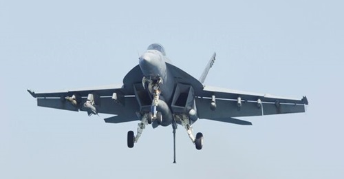An F/A-18E on final approach to landing.