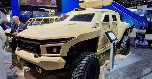 GM Defense unveiled its armoured NGLTWV concept at IDEX 2023. This combines the Chevrolet Silverado commercial pickup truck chassis with GM's Ultium battery technology.