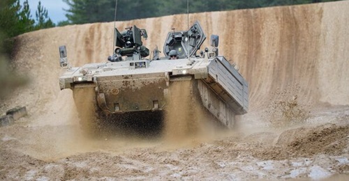 An Ajax Ares armoured personnel carrier on the Bovington training range during a visit by Wallace on 22 February.