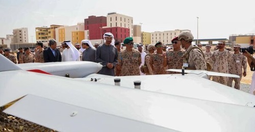 UAE President Sheikh Mohammed bin Zayed and Malaysia's king Al-Sultan Abdullah inspect unidentified UAVs at the end of Exercise 'Desert Tiger 6'. The detla-wing type's engine is obscured by the wing of a larger UAV, probably a Wing Loong II.