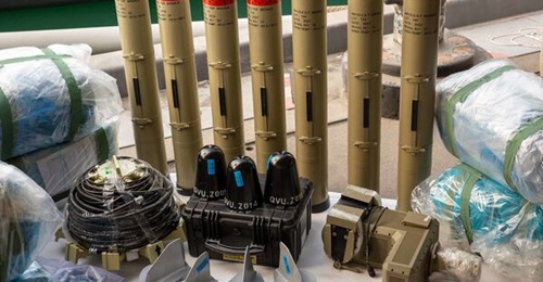 The 5th Fleet identified some of the recovered items as a set of jet vanes for a ballistic missile at the front, three impact sensor caps for ballistic missiles on top of the black box, and Iranian copies of the Kornet anti-tank missile at the rear. Th...