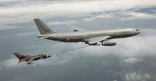 A UK Royal Air Force A330 tanker owned by AirTanker Holdings Ltd prepares to refuel a Tornado strike aircraft.
