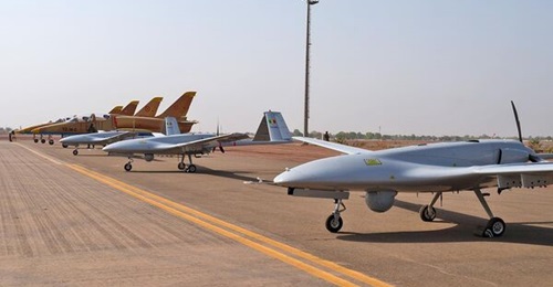 Bayraktar TB2 UAVs and L-39 jets lined up for a handover ceremony at Bamako's international airport on 16 March.