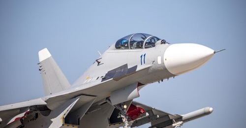 The introduction of SAC J-11s in the China's flight academies has allowed the PLAAF to enhance the combat readiness of its graduating pilots. The aircraft in this photograph is shown taking off for a training session in eastern China's Zhejiang provinc...