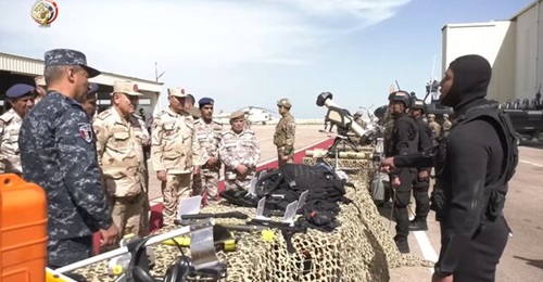 Egyptian naval special forces display weapons that include an Akeron MP to a Qatari delegation at their base in Abu Qir.
