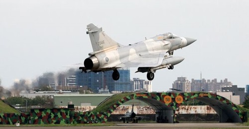 A Taiwanese Mirage 2000 fighter jet lands at an air force base in Hsinchu, Taiwan, on 9 April 2023 as China was conducting a second day of military drills near the country.