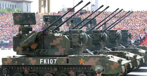 The PLA has deployed PGZ-09 SPAAGs, an example of which is pictured above from a parade in Beijing in September 2015, along the Taiwan Strait. The service also deployed the HQ-17 SHORAD system and 122 mm PZH-11 MLRSs in the area.