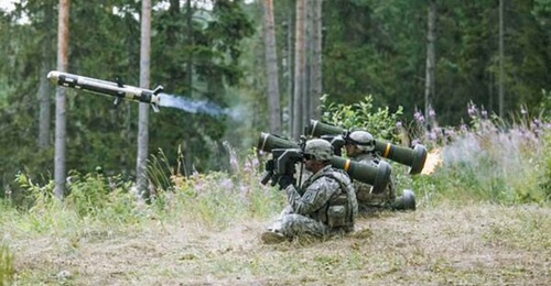 The Javelin is a medium-range, manportable, shoulder-fired, fire-and-forget, lock-on-before-launch ATGM system. The picture shows US Army soldiers firing Javelins during an exercise in Estonia.