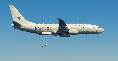 A High Altitude Anti-Submarine Warfare Weapon Capability-configured Mk 54 lightweight torpedo is dropped from a US Navy P-8A Poseidon MPA during testing. The wing kit adaptor is visible atop the torpedo body. The Mk 54 torpedo is used by many countries...