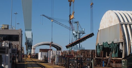 As Newport News Shipbuilding is building aircraft carrier 
        
        , the yard finds it needs to outsource unit and panel work.