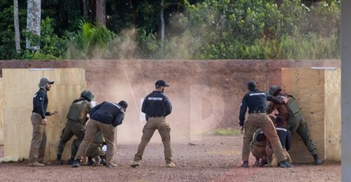 Trainers wearing the logo of Sparta Security Solutions and Israeli flag patches train special forces personnel in Equatorial Guinea.