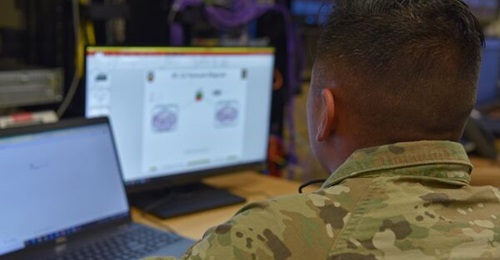 A US Army network engineer at Joint Modernization Command works on creating the Project Convergence Mission Partner Environment at Fort Bliss, Texas.
